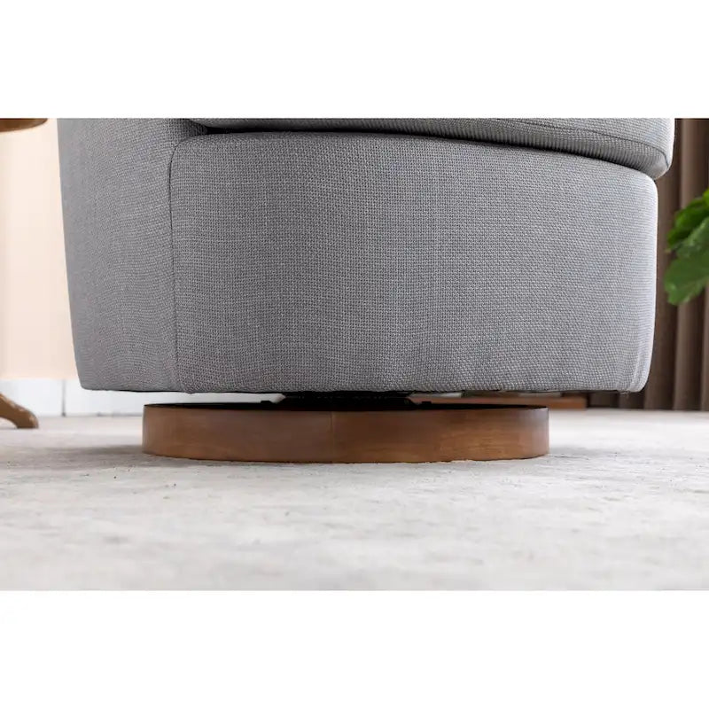 Poltrona decorativa girevole azzurra con base in legno marrone
