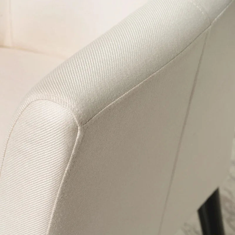 Upholstered Fabric Armchair with Curved Arms and Black Legs