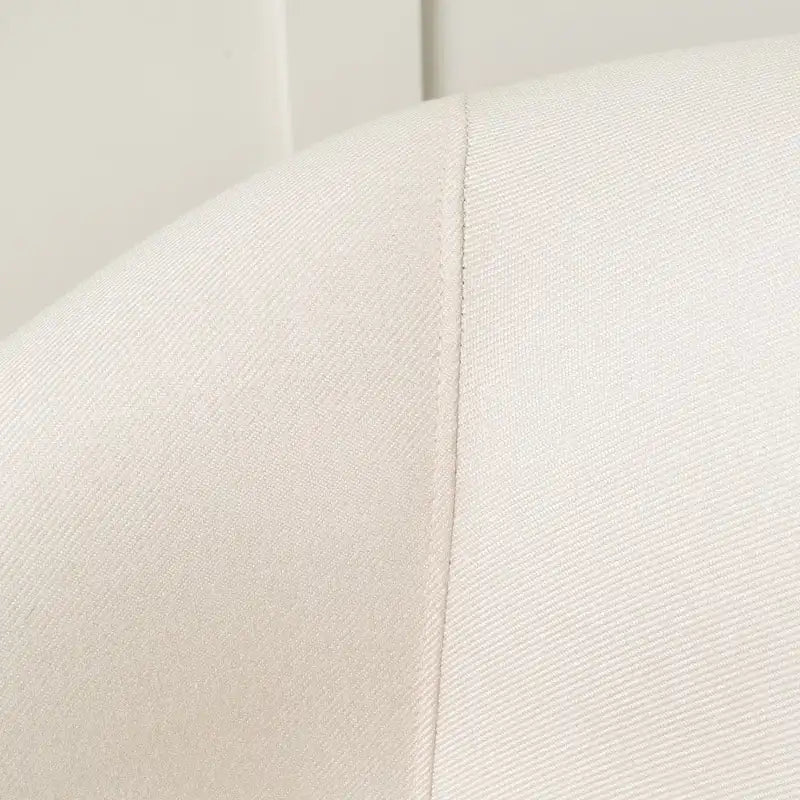 Upholstered Fabric Armchair with Curved Arms and Black Legs